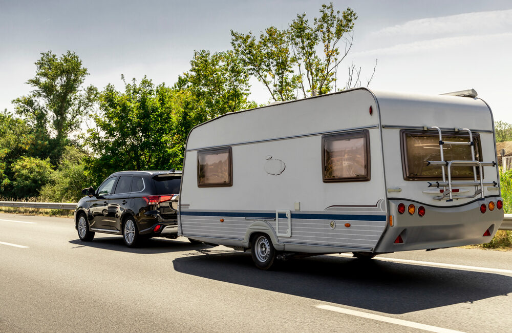 SUV towing a recreational vehicle