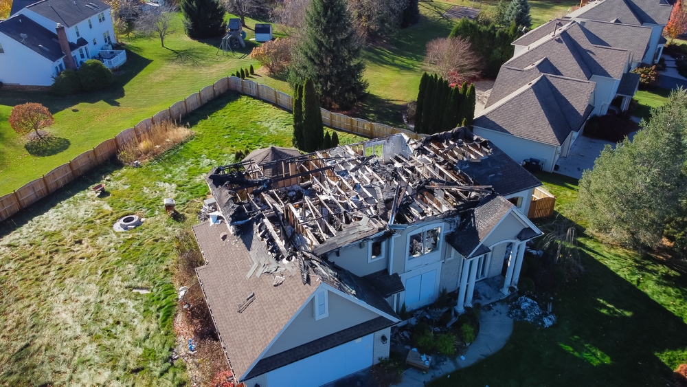roof on a home severely damaged from house fire