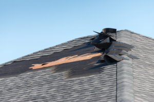 roof shingles damaged by wind